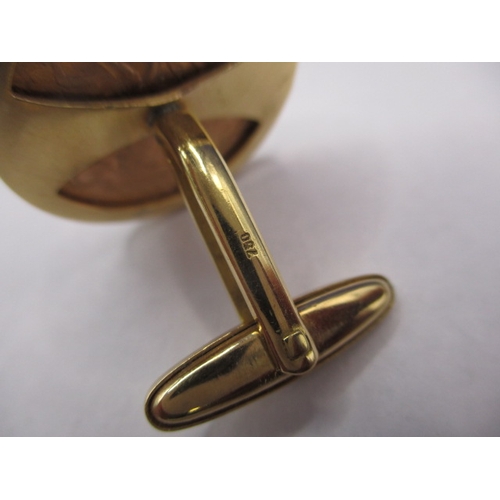 62 - A pair of 18ct gold cufflinks, each with a 1931 sovereign coin, approx. parcel weight 28.1g in good ... 