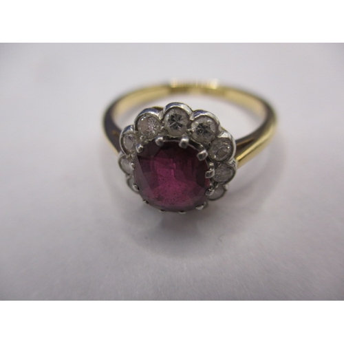 30 - A vintage 18ct yellow gold diamond and ruby daisy ring, approx. ring size ‘N’ approx. weight 3.2g in... 