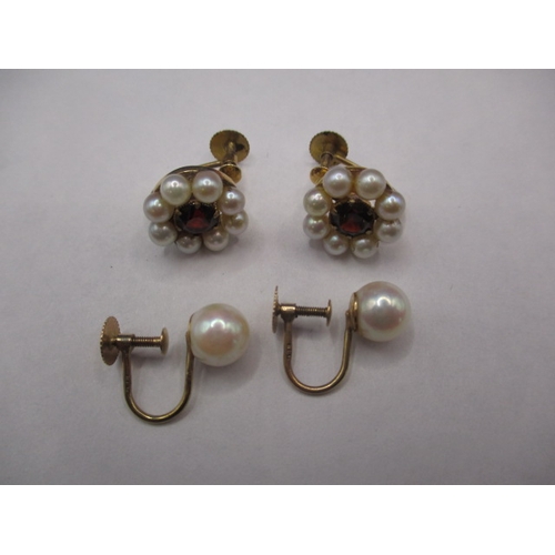 73 - Two pairs of 9ct gold screw-on earrings, each set with pearls, both in used condition