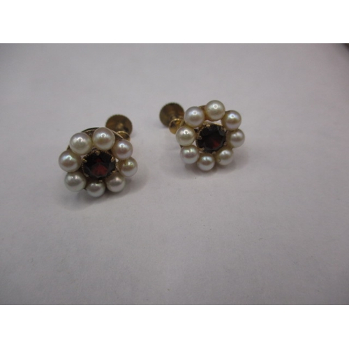 73 - Two pairs of 9ct gold screw-on earrings, each set with pearls, both in used condition