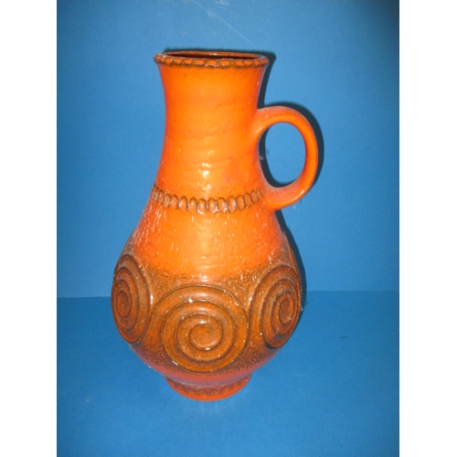 280 - A large German orange glazed ewer vase, approx. height 46cm having minor surface marks and paint spl... 