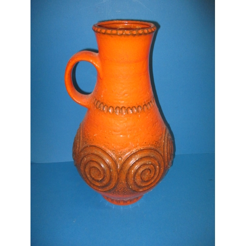 280 - A large German orange glazed ewer vase, approx. height 46cm having minor surface marks and paint spl... 