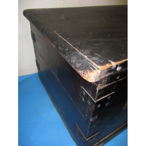 307 - A vintage black painted pine storage trunk, approx. size 96x48x37cm in well used condition with age-... 