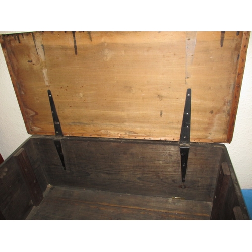 307 - A vintage black painted pine storage trunk, approx. size 96x48x37cm in well used condition with age-... 