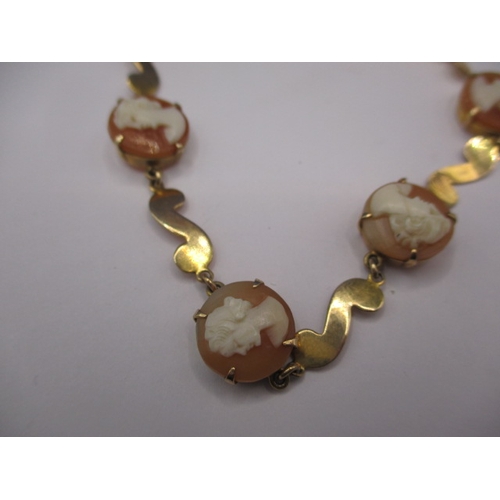 75 - A vintage 9ct gold cameo bracelet and a 9ct gold cased watch with plated strap, in used condition wi... 