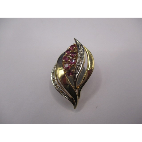 76 - A 9ct gold diamond and ruby brooch, approx. weight 3.9g in good pre-owned condition