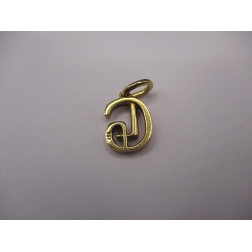 77 - An 18ct yellow gold necklace pendant, in the form of a stylised G, approx. weight 4g, in good pre-ow... 