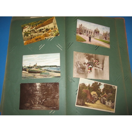 281 - An album of Edwardian and later post cards, all in used condition