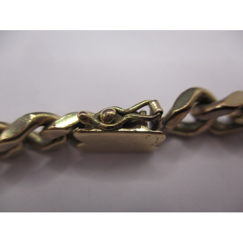 57 - A 9ct yellow gold curb link bracelet, approx. linear length 21cm, approx. weight 39.9g, in pre-owned... 