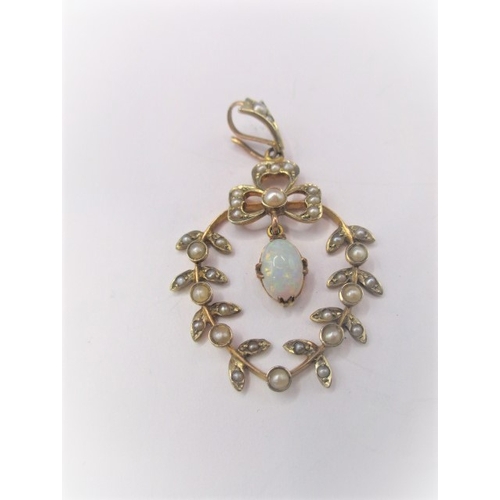 78 - A vintage 9ct gold necklace pendant, having hanging opal surrounded by a ring of seed pearls, approx... 