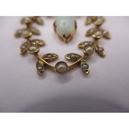 78 - A vintage 9ct gold necklace pendant, having hanging opal surrounded by a ring of seed pearls, approx... 