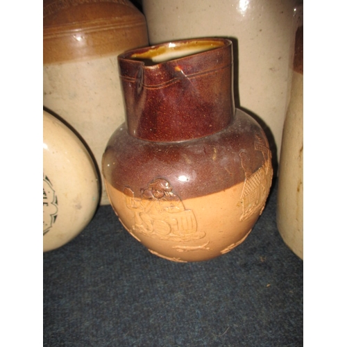 12 - A parcel of antique and later stoneware jars, to include a Doulton harvest jug, all in used conditio... 