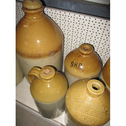 29 - A parcel of antique and later stoneware jars, all in used condition a few with chips and missing han... 