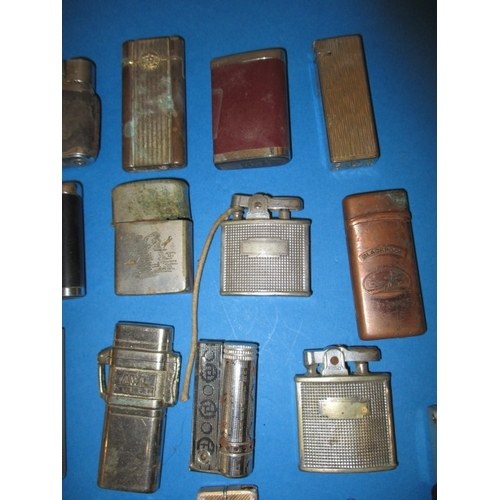 33 - A parcel of vintage cigarette lighters, various makers, all with use-related marks, none tested as t... 