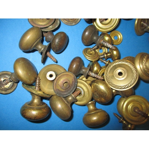 37 - A parcel of vintage brass furniture fittings, to include handles and castors, all in used condition