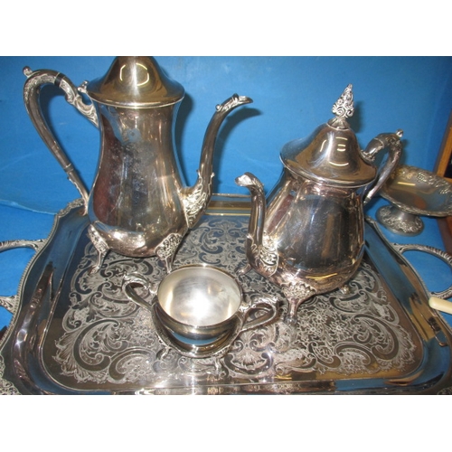 46 - A parcel of silver plated items, to include a tea set on tray and assorted cutlery, all in used cond... 