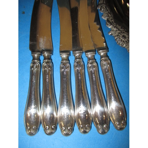 46 - A parcel of silver plated items, to include a tea set on tray and assorted cutlery, all in used cond... 