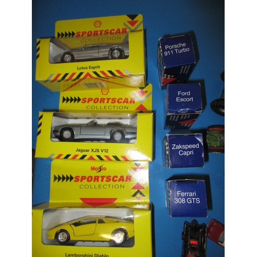 48 - A parcel of vintage model vehicles to include Star ship Enterprise and Scalextric drive steering con... 