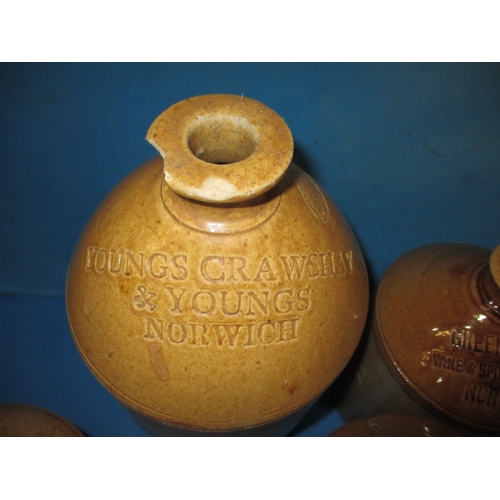 53 - A parcel of antique stoneware jars, all with Norwich company names, one with a chip to top, no other... 