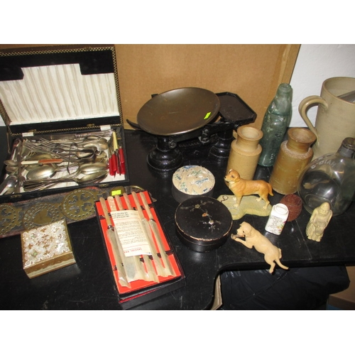 63 - A parcel of general clearance items, to include codds bottles, kitchen scales and cutlery, all in us... 