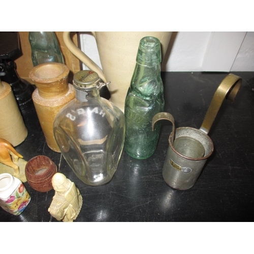 63 - A parcel of general clearance items, to include codds bottles, kitchen scales and cutlery, all in us... 