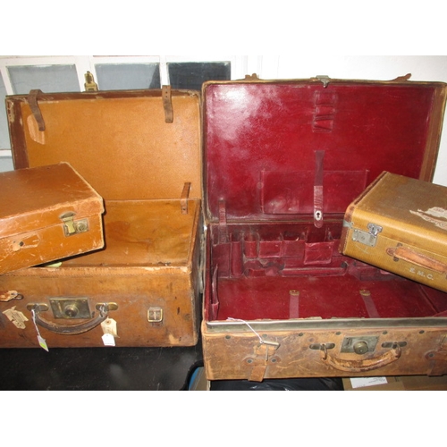 68 - 4 Vintage suit cases, 2 large leather examples and one with compartmented interior, some broken stra... 