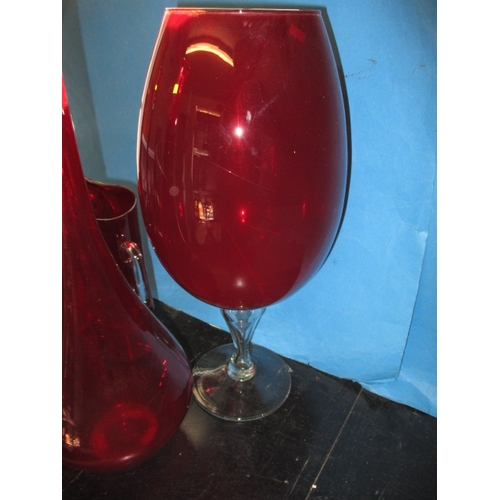 72 - A parcel of vintage cranberry glass items, to include a large goblet, approx. height of tallest piec... 