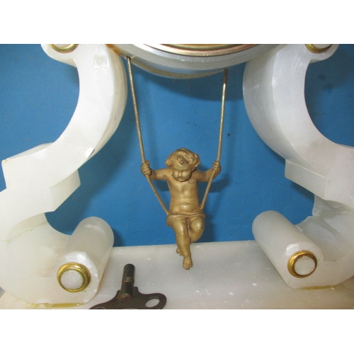 74 - An antique alabaster clock with swinging cherub pendulum, under original glass dome, dome in good co... 