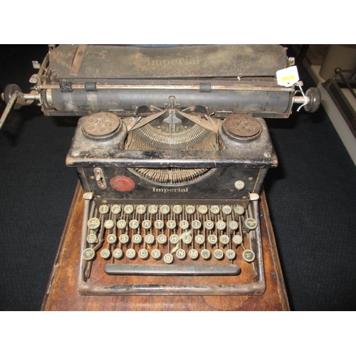 84 - An early 20th century Imperial typewriter, working but would benefit from a full service, having gen... 