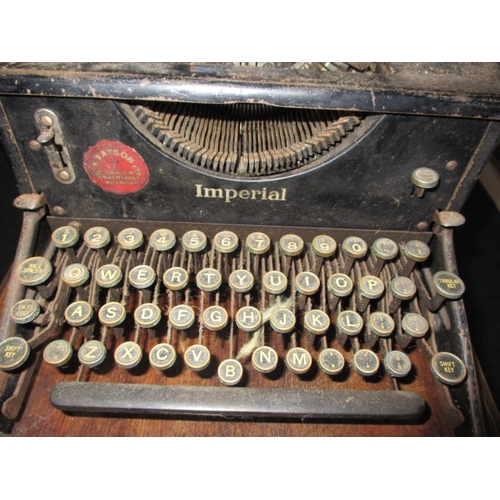 84 - An early 20th century Imperial typewriter, working but would benefit from a full service, having gen... 