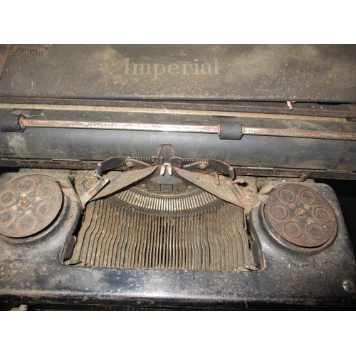 84 - An early 20th century Imperial typewriter, working but would benefit from a full service, having gen... 