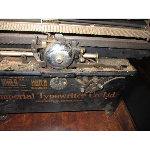 84 - An early 20th century Imperial typewriter, working but would benefit from a full service, having gen... 