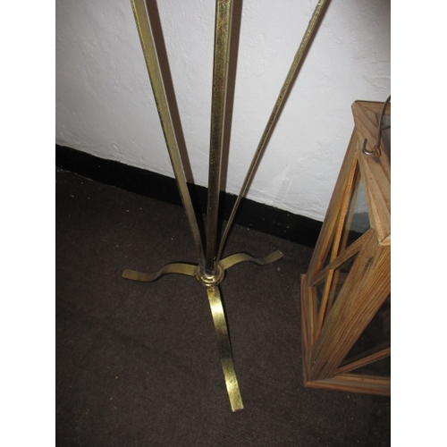 88 - A floor standing 5 branch candle holder and a large hanging lantern example, both in good used condi... 