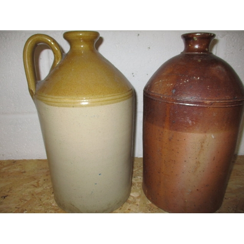 100 - Two vintage stoneware bottles, both in good condition