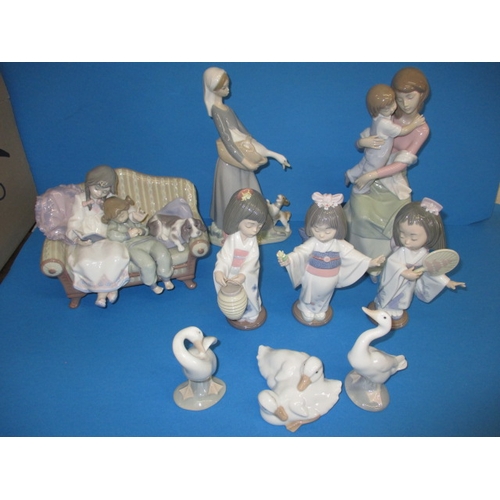 107 - A parcel of vintage Lladro porcelain figures, all in good condition with no observed damage  or rest... 