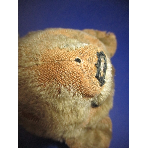 113 - A C1930s teddy bear, in play worn condition, approx. height 30cm