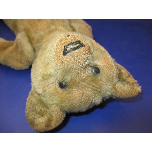 113 - A C1930s teddy bear, in play worn condition, approx. height 30cm