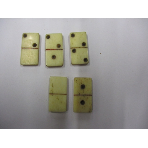 131 - 20 Vintage hand cut bone dominos, each measuring approx. 2cm x 1cm, in good used condition