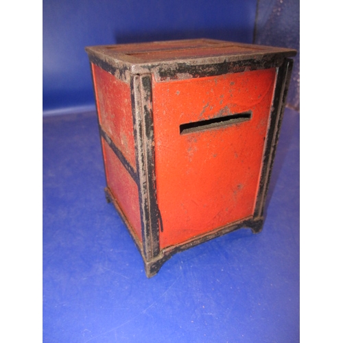 133 - A vintage  steel money box in the form of a safe, with key and use-related marks