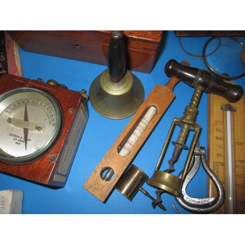 135 - A parcel of collectable items to include test meters, a corkscrew and coins, all in used condition