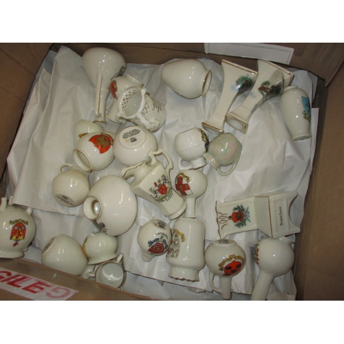 136 - A very large quantity of crested china, to include examples by Goss and Arcadian, all with no observ... 