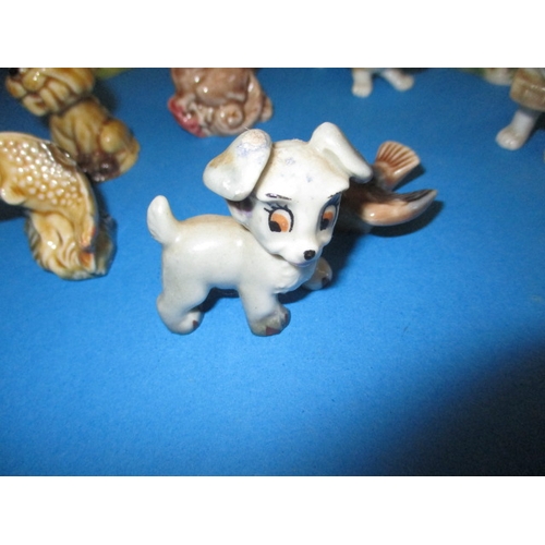 139 - A large collection of vintage miniature ceramic animals, most by Wade, all with no observed damage