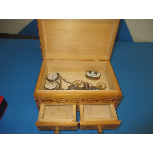 141 - A 2 drawer jewellery box with contents, all in used condition and one rear foot missing