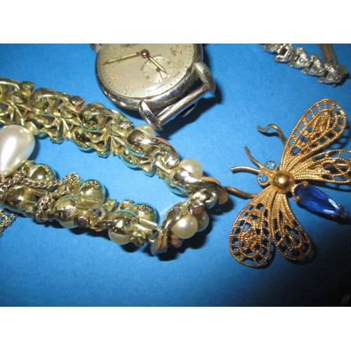 148 - A parcel of vintage costume jewellery and watches, to include some silver items, all in used conditi... 