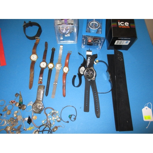 A parcel of watches and costume jewellery to include examples by Gucci and Swatch, some silver jewellery, all in used condition and not tested