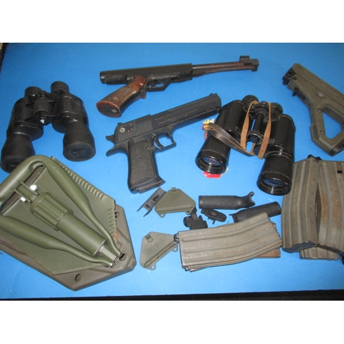 168 - An air pistol an air-soft pistol and an assortment of weapon training items, all in used condition a... 