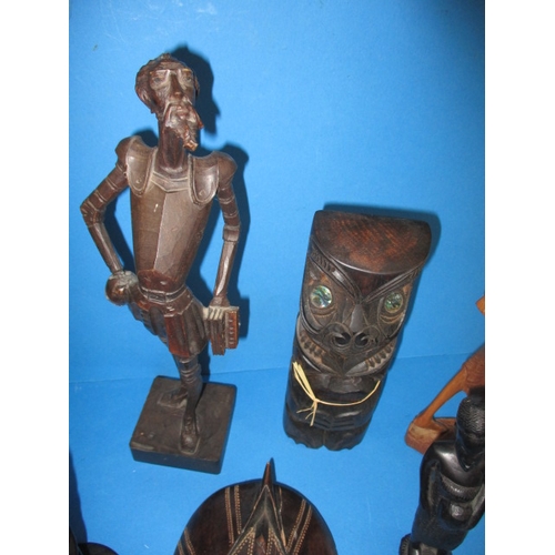 171 - A parcel of treen items, to include African figures and masks, one mask repaired, all in used condit... 