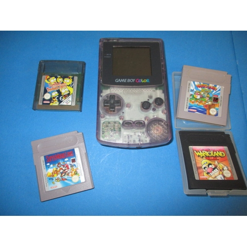 173 - A Nintendo Gameboy Colour and 4 games, in used condition and not tested as to function