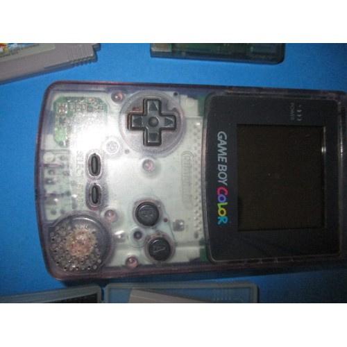 173 - A Nintendo Gameboy Colour and 4 games, in used condition and not tested as to function