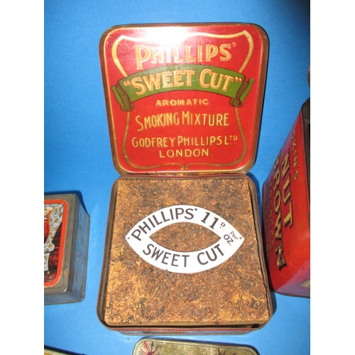 339 - A parcel of antique and later tobacco tins, to include a large Adkins nut brown and an Ogdens coolie... 